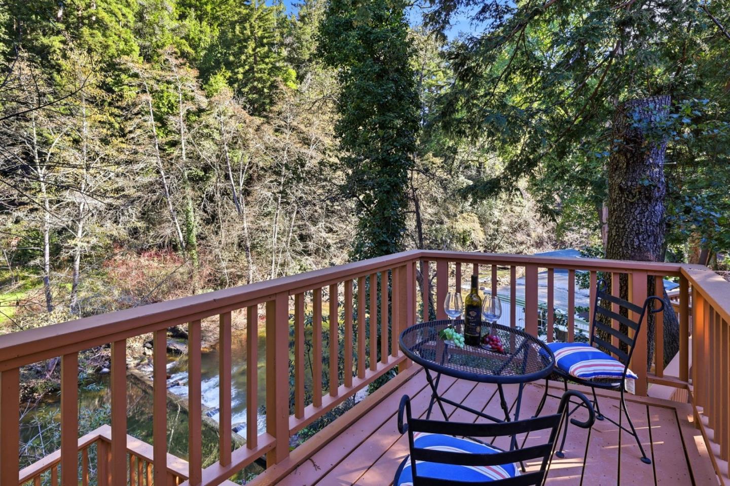 265 Brown Gables Road, Unit 11 Ben Lomond, CA 95005 - Photo 19 of 50 a view of a chair in wooden balcony