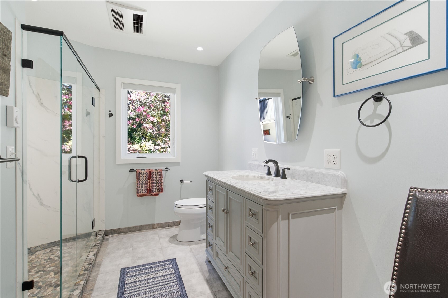 3050 Southeast Mullenix Road Port Orchard, WA 98367 - Photo 18 of 40 a bathroom with a sink toilet and shower