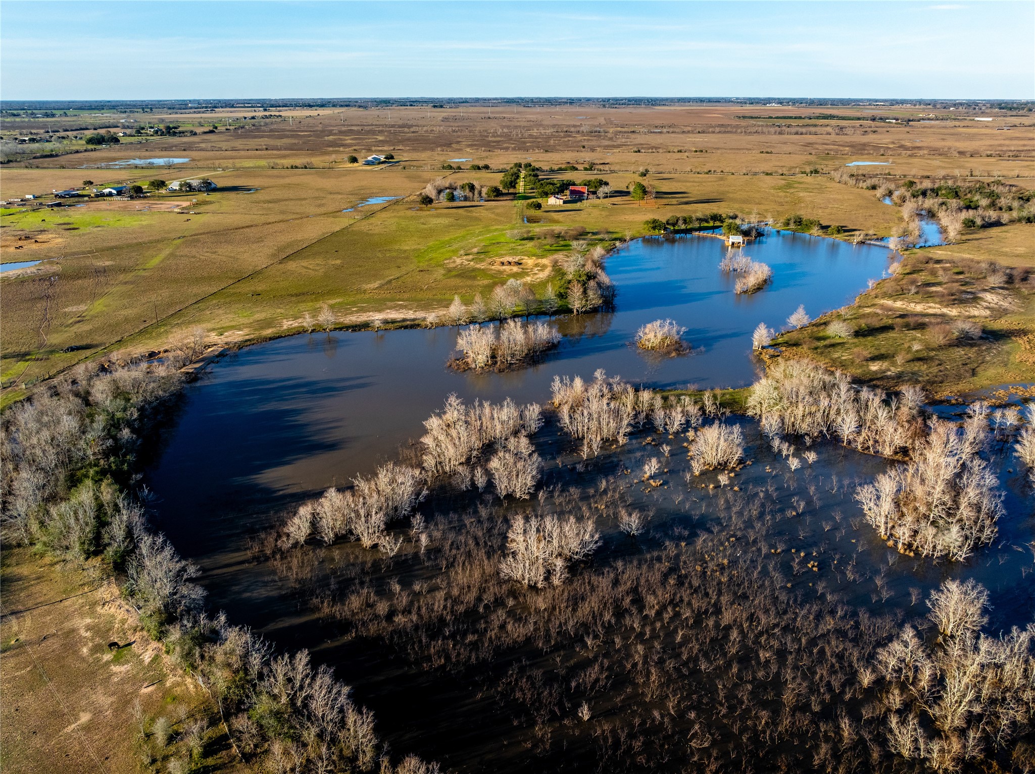Incredible Opportunity: 392 Acres of Prime Land in Waller County! This stunning property offers unmatched potential & versatility, whether you're looking to develop, farm, or create your private country estate. A charming 2-story barndominium, featuring 2 spacious bedrooms, 2 bathrooms, & oversized 2-car garage. Relax on the expansive front & back porches,or take in breathtaking panoramic views from the second-story deck.