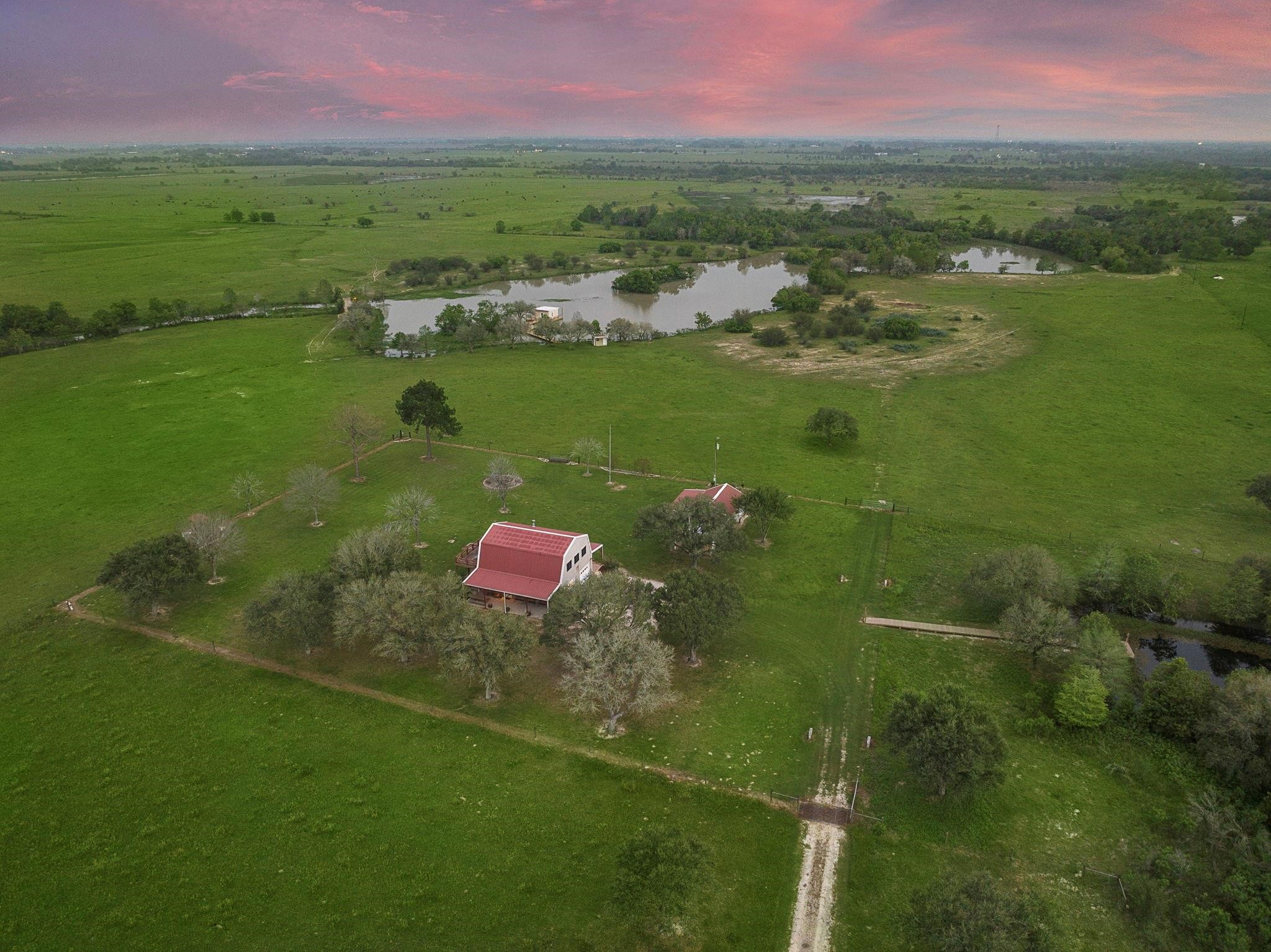 36067 Repka Road Waller, TX 77484 - Photo 4 of 14 Aerial of home, shop and main lake