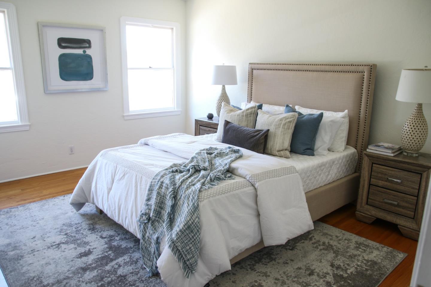 747 North 18th Street San Jose, CA 95112 - Photo 19 of 39 a bed sitting in a bedroom next to a window