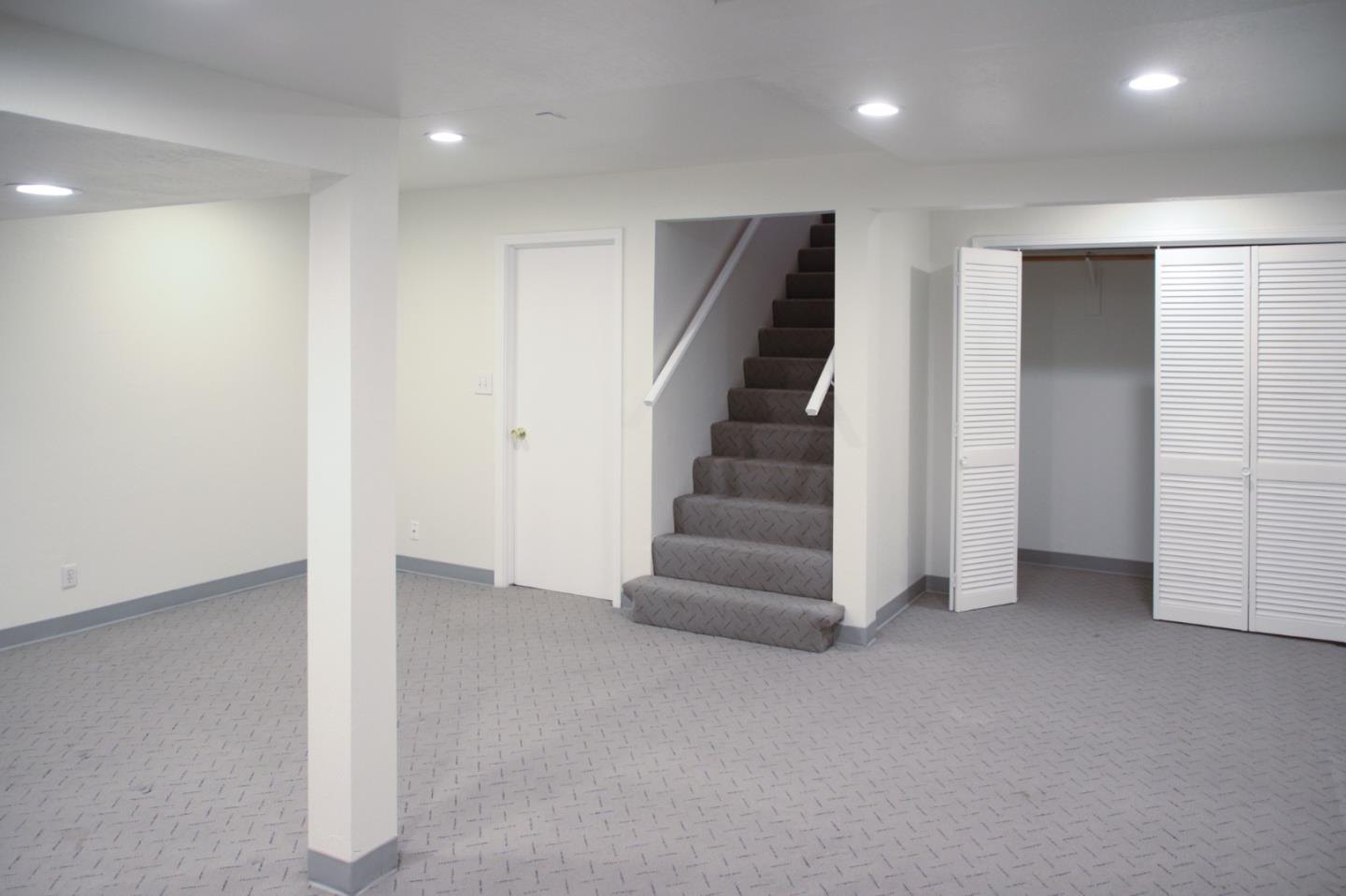 747 North 18th Street San Jose, CA 95112 - Photo 31 of 39 an empty room with stairs and white walls