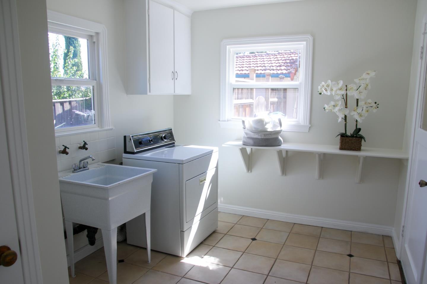 747 North 18th Street San Jose, CA 95112 - Photo 32 of 39 a kitchen with a sink cabinets and window
