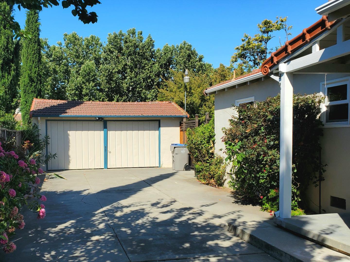 747 North 18th Street San Jose, CA 95112 - Photo 37 of 39 a front view of a house with a yard and garage