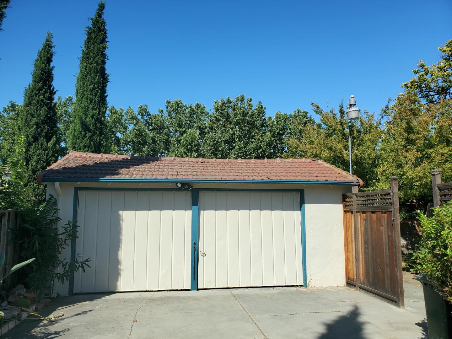 747 North 18th Street San Jose, CA 95112 - Photo 38 of 39 a house with trees in the background