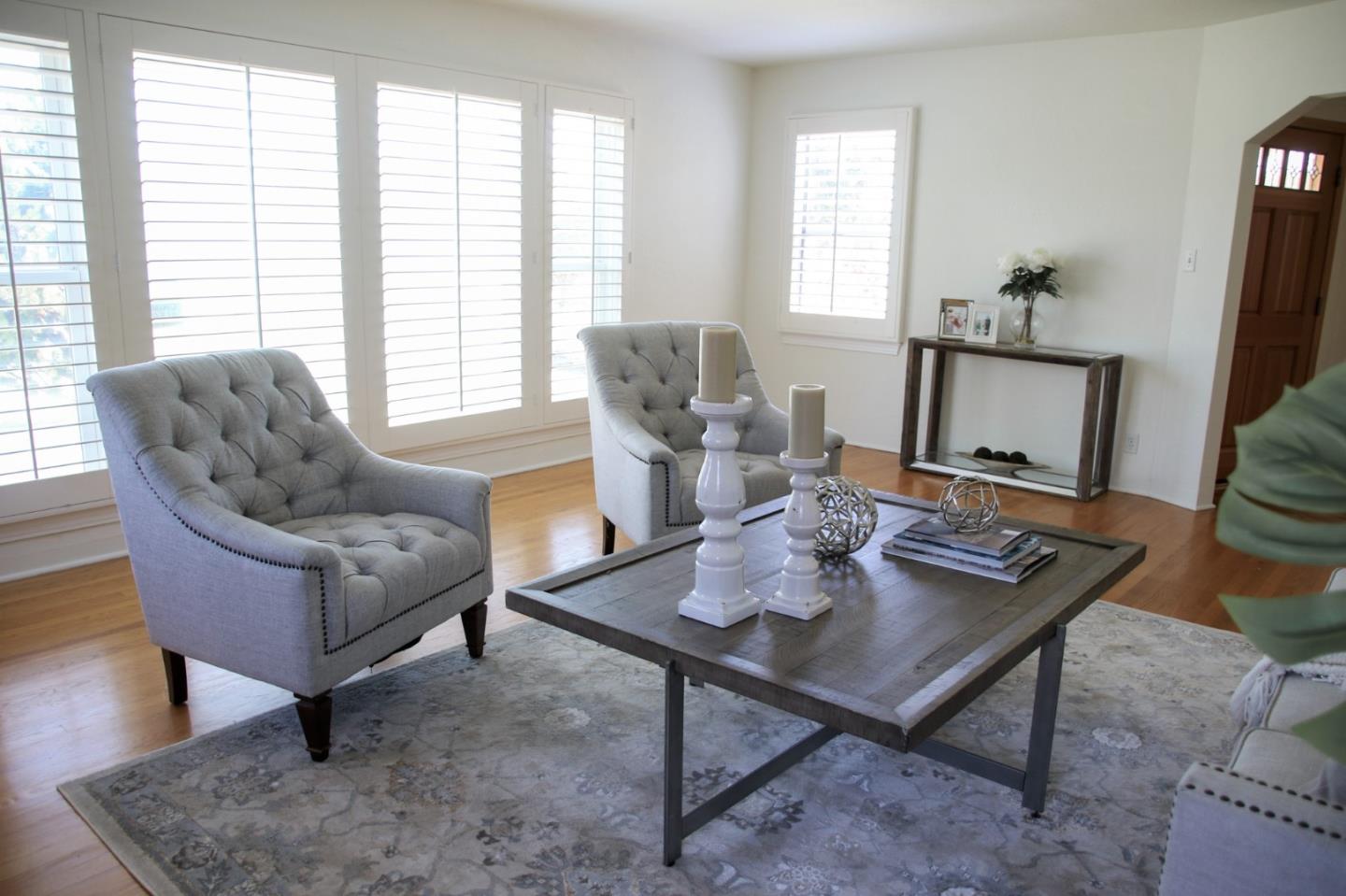 747 North 18th Street San Jose, CA 95112 - Photo 7 of 39 a living room with furniture and a window