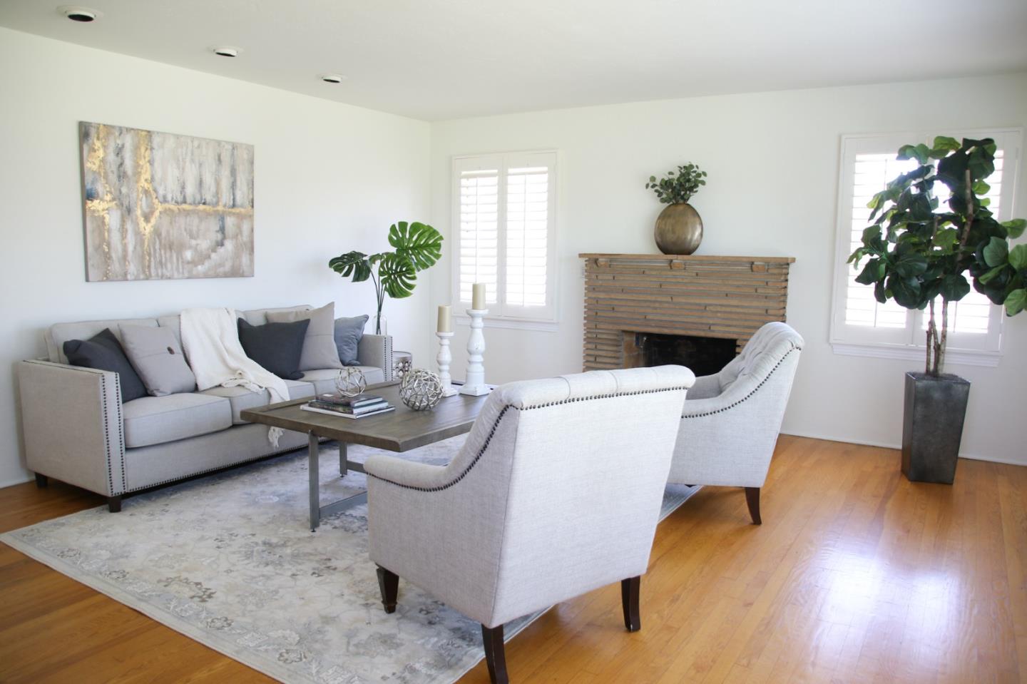 747 North 18th Street San Jose, CA 95112 - Photo 8 of 39 a living room with furniture potted plant and a fireplace