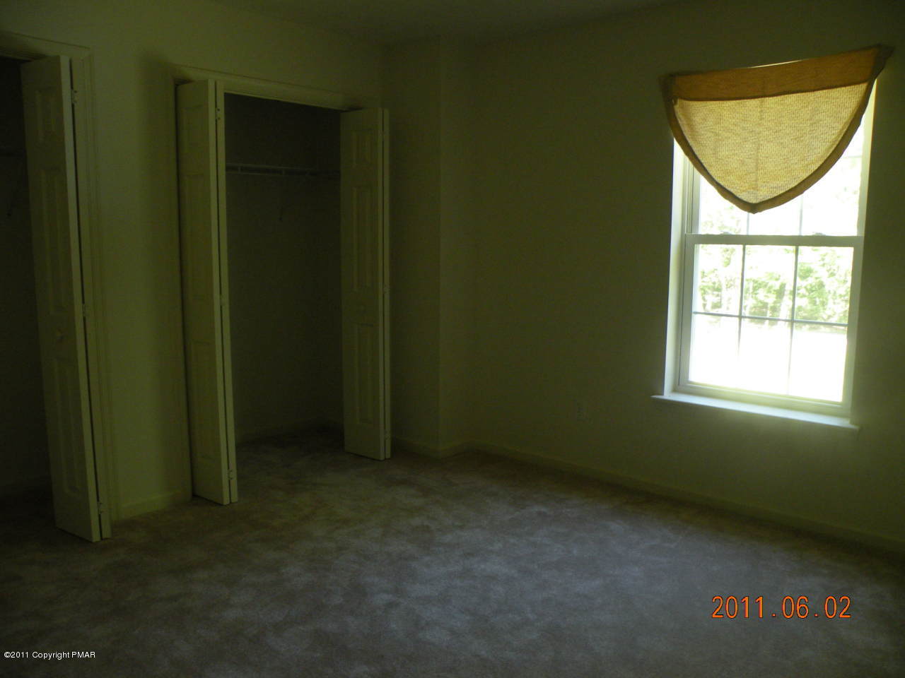 315 Red Run Road Pocono Summit, PA 18346 - Photo 5 of 10 an empty room with a window