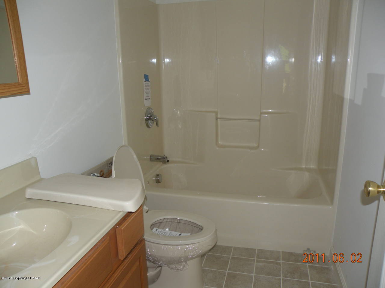 315 Red Run Road Pocono Summit, PA 18346 - Photo 7 of 10 a bathroom with a sink a toilet and shower