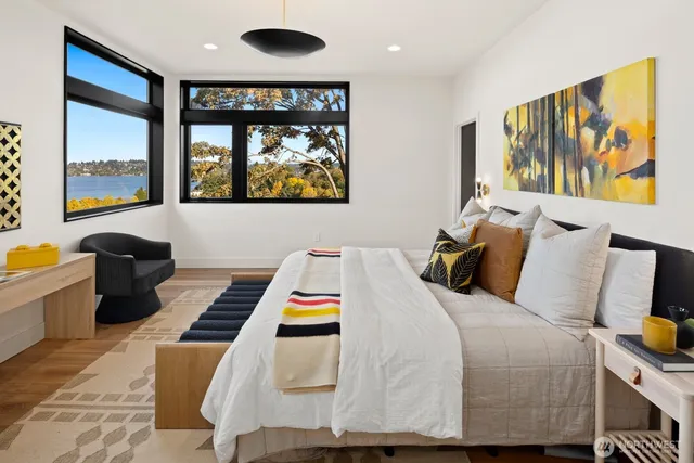 view of living room with furniture and floor to ceiling window