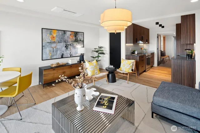 a front view of a building with a garden