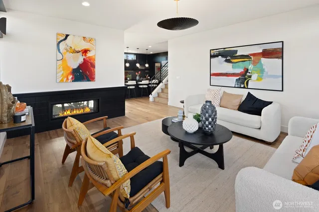 a front view of a house with sitting area