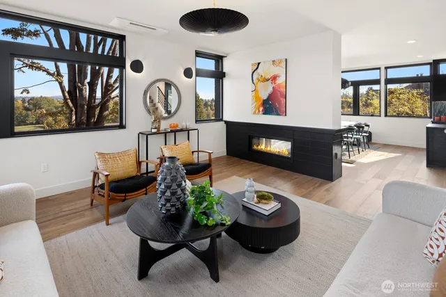 a table room with furniture and a potted plant