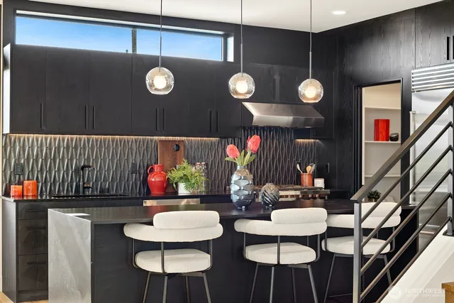 a view of a dining room and livingroom with furniture window wooden floor