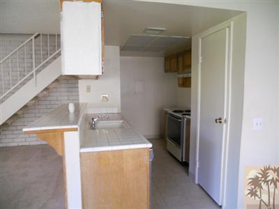 72644 Raven Road, Unit 3 Palm Desert, CA 92260 - Photo 5 of 11 a utility room with washer and dryer