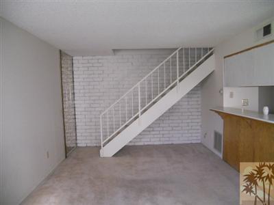72644 Raven Road, Unit 3 Palm Desert, CA 92260 - Photo 6 of 11 a view of entryway and kitchen