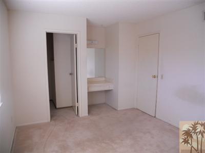 72644 Raven Road, Unit 3 Palm Desert, CA 92260 - Photo 7 of 11 a view of an empty room and a bathroom