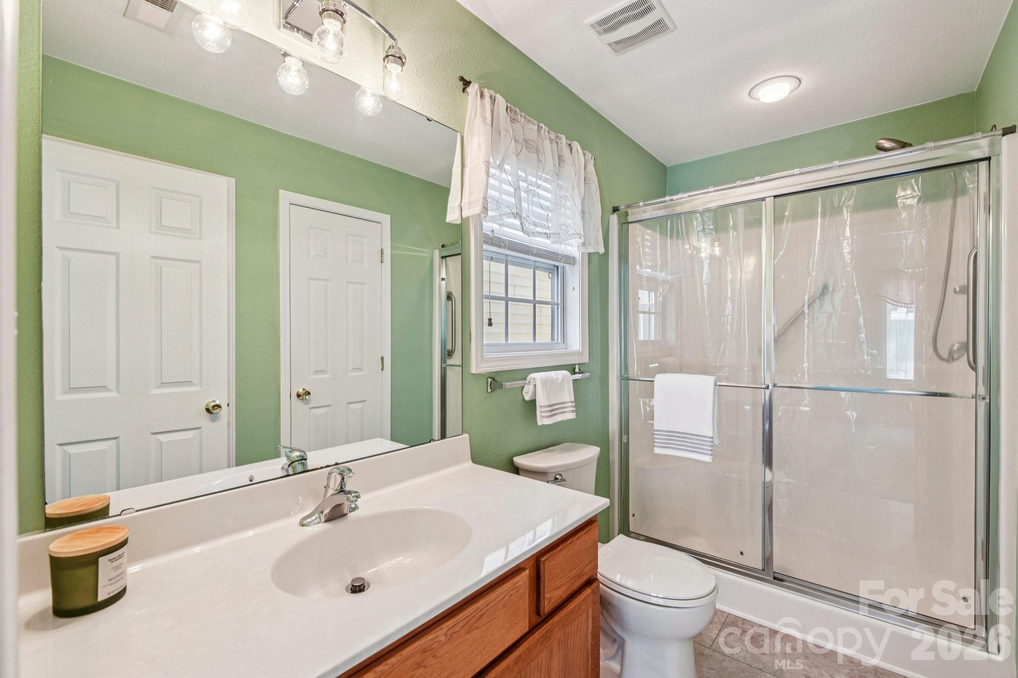 3741 Capris Lane Fort Mill, SC 29707 - Photo 11 of 22 a bathroom with a sink toilet and shower