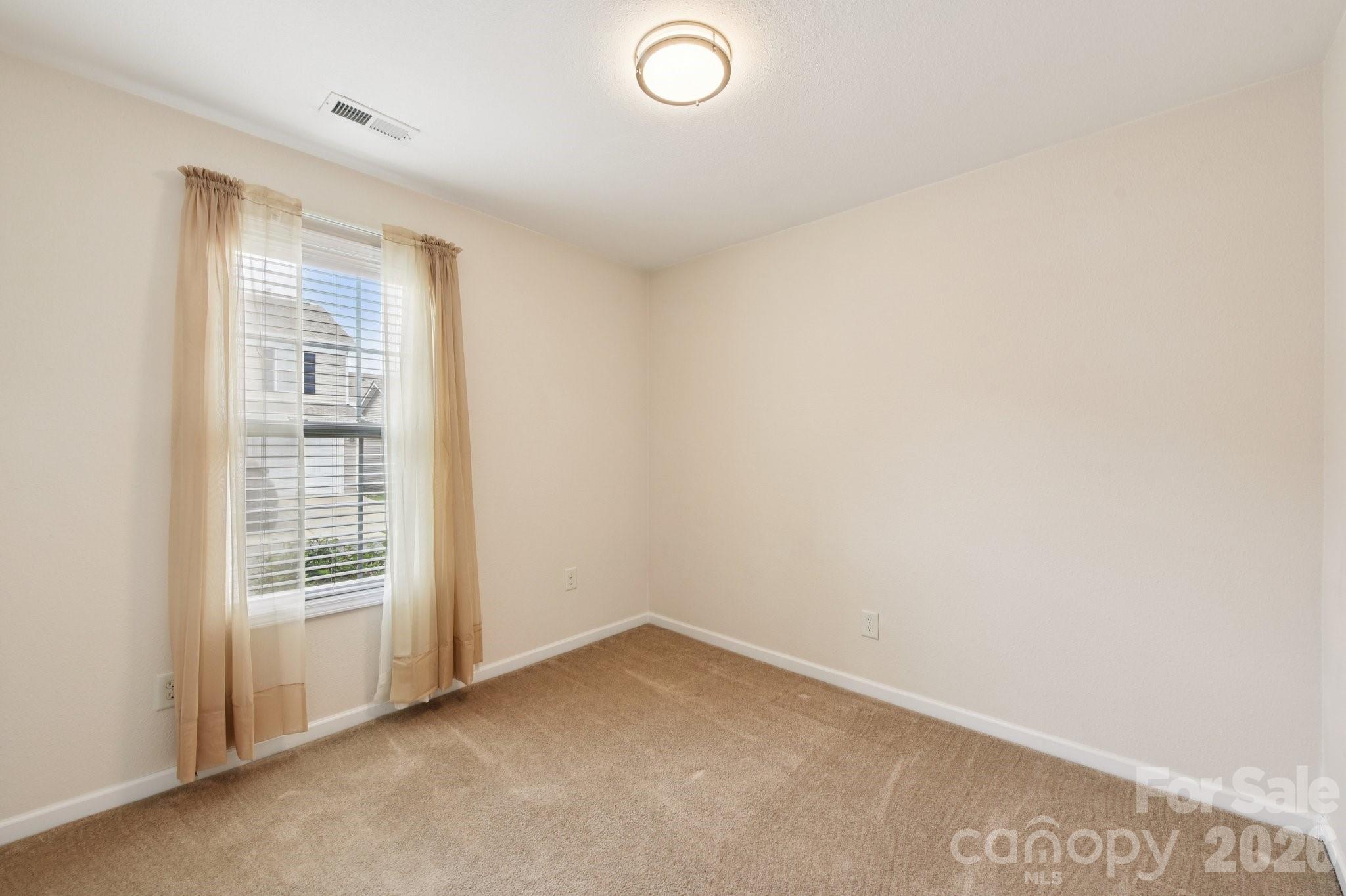 3741 Capris Lane Fort Mill, SC 29707 - Photo 12 of 22 a view of an empty room with a window
