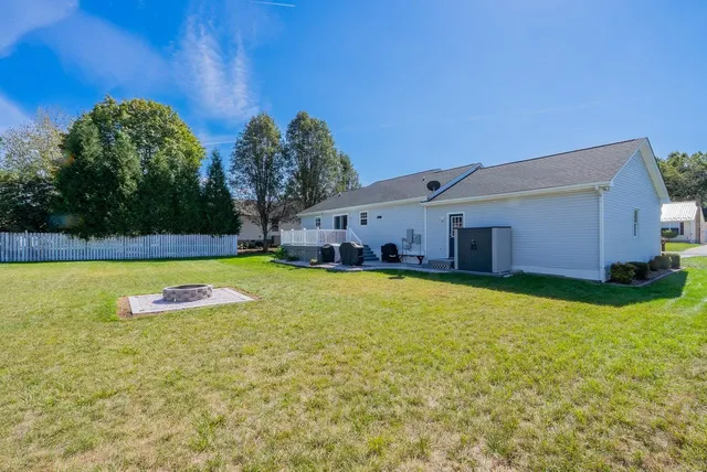 a view of swimming pool outdoor seating and deck