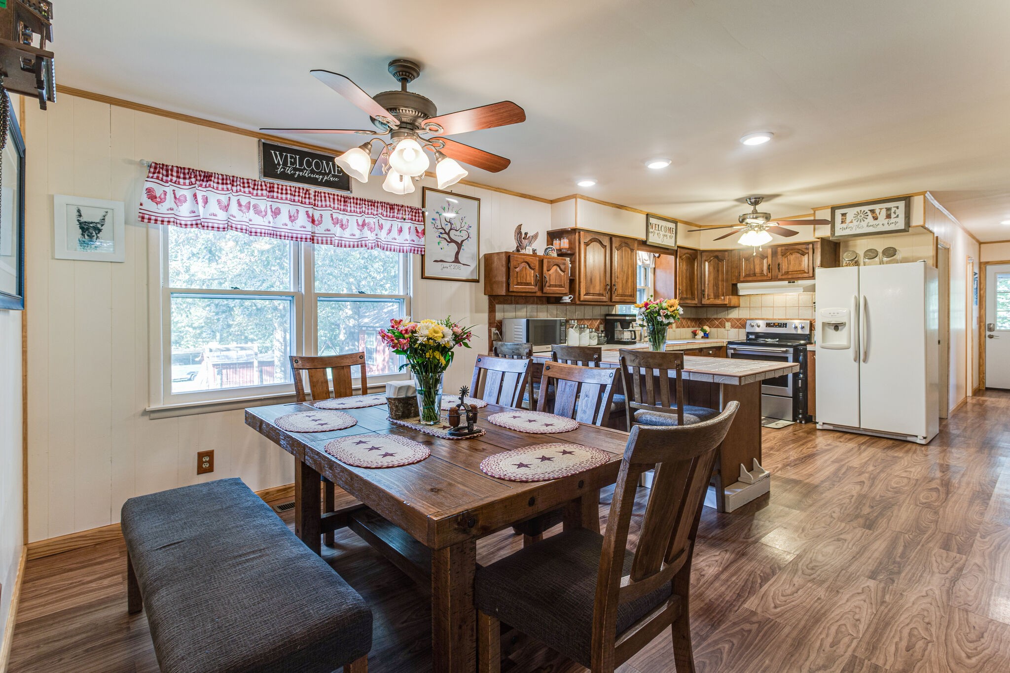 645 C Anderson Road Manchester, TN 37355 - Photo 14 of 47 a view of a dining room with furniture window and wooden floor