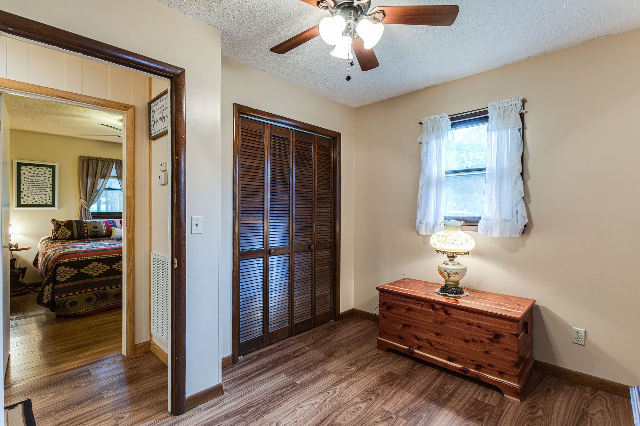 645 C Anderson Road Manchester, TN 37355 - Photo 22 of 47 a bedroom with furniture and wooden floor