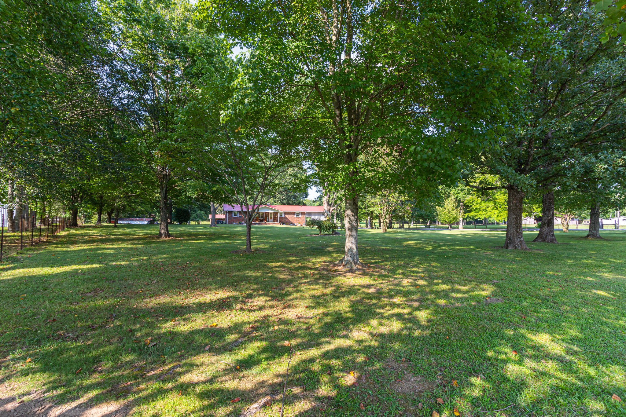 645 C Anderson Road Manchester, TN 37355 - Photo 4 of 47 a view of a park with trees and grass