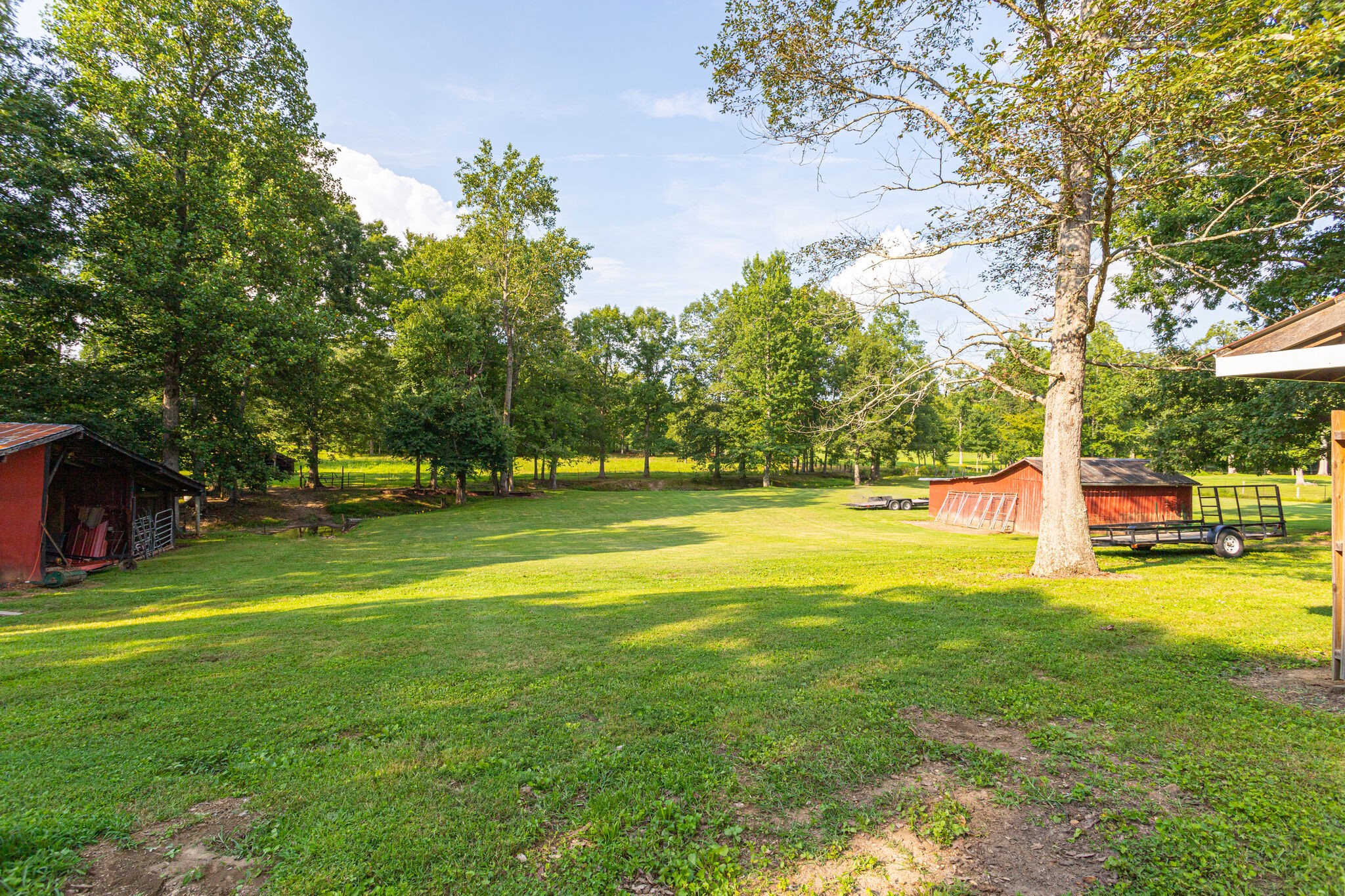 645 C Anderson Road Manchester, TN 37355 - Photo 33 of 47 a view of a swimming pool with an outdoor space and seating area