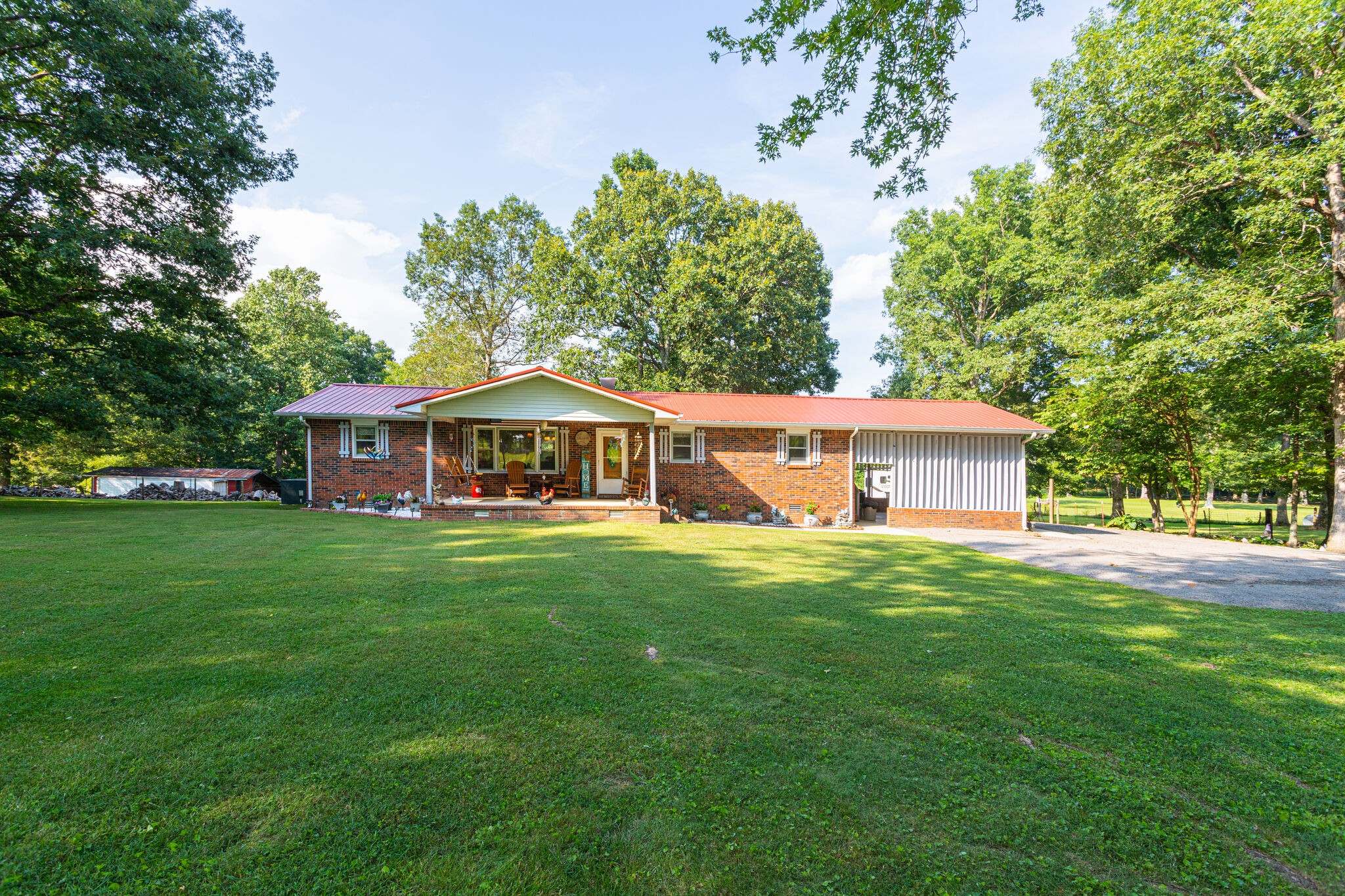 645 C Anderson Road Manchester, TN 37355 - Photo 6 of 47 a front view of a house with a garden