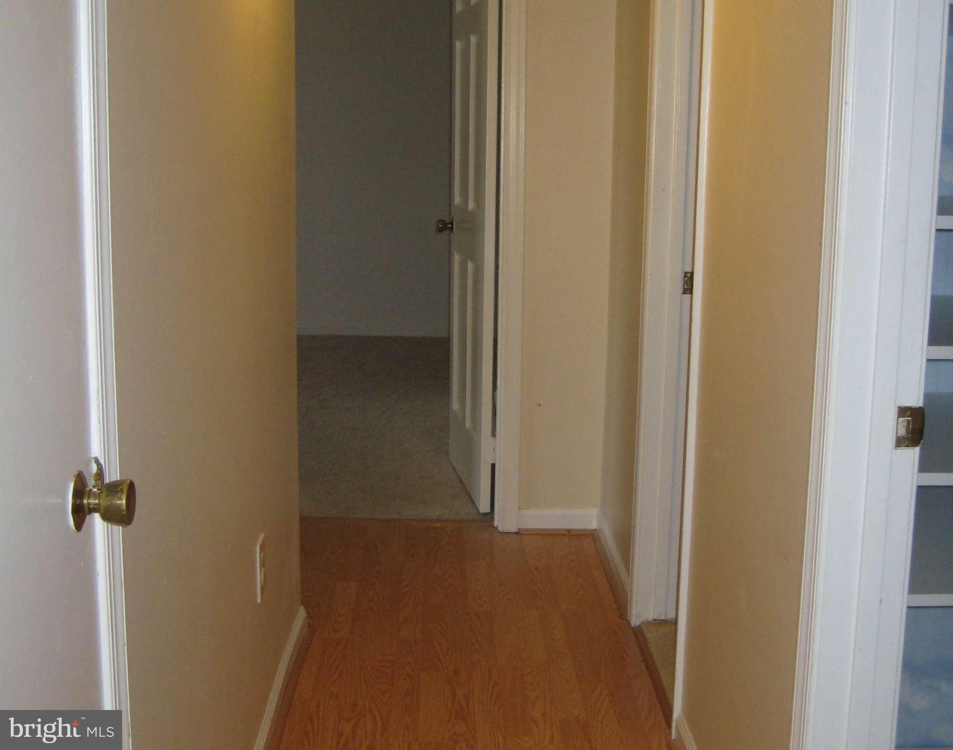 2226 Hunter's Run Drive, Unit 2226 Reston, VA 20191 - Photo 14 of 26 a view of a livingroom from a hallway