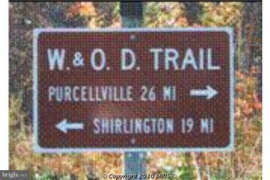 2226 Hunter's Run Drive, Unit 2226 Reston, VA 20191 - Photo 24 of 26 a sign broad
