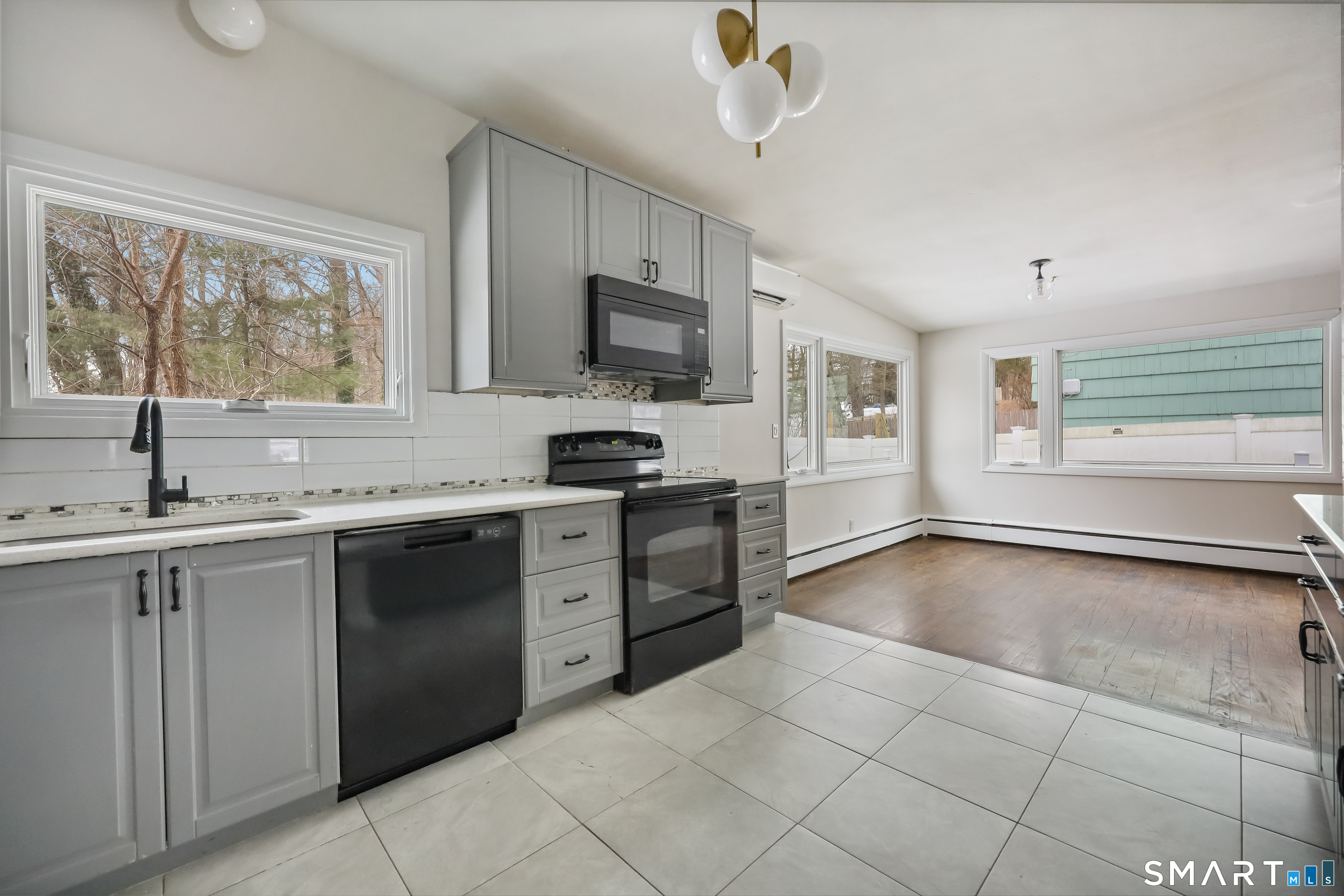 110 Corbin Road Hamden, CT 06517 - Photo 14 of 29 a kitchen with a sink cabinets and window