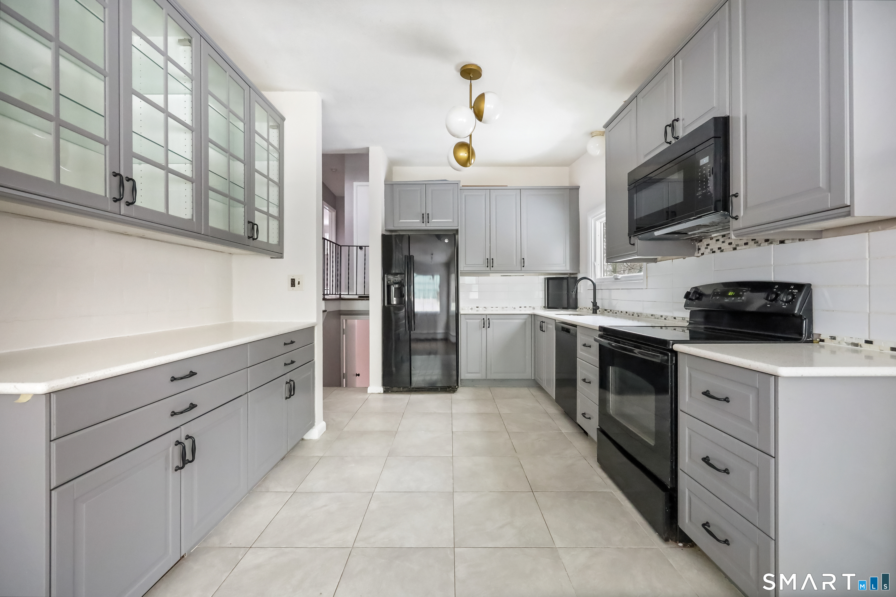 110 Corbin Road Hamden, CT 06517 - Photo 15 of 29 a kitchen with stainless steel appliances and cabinets