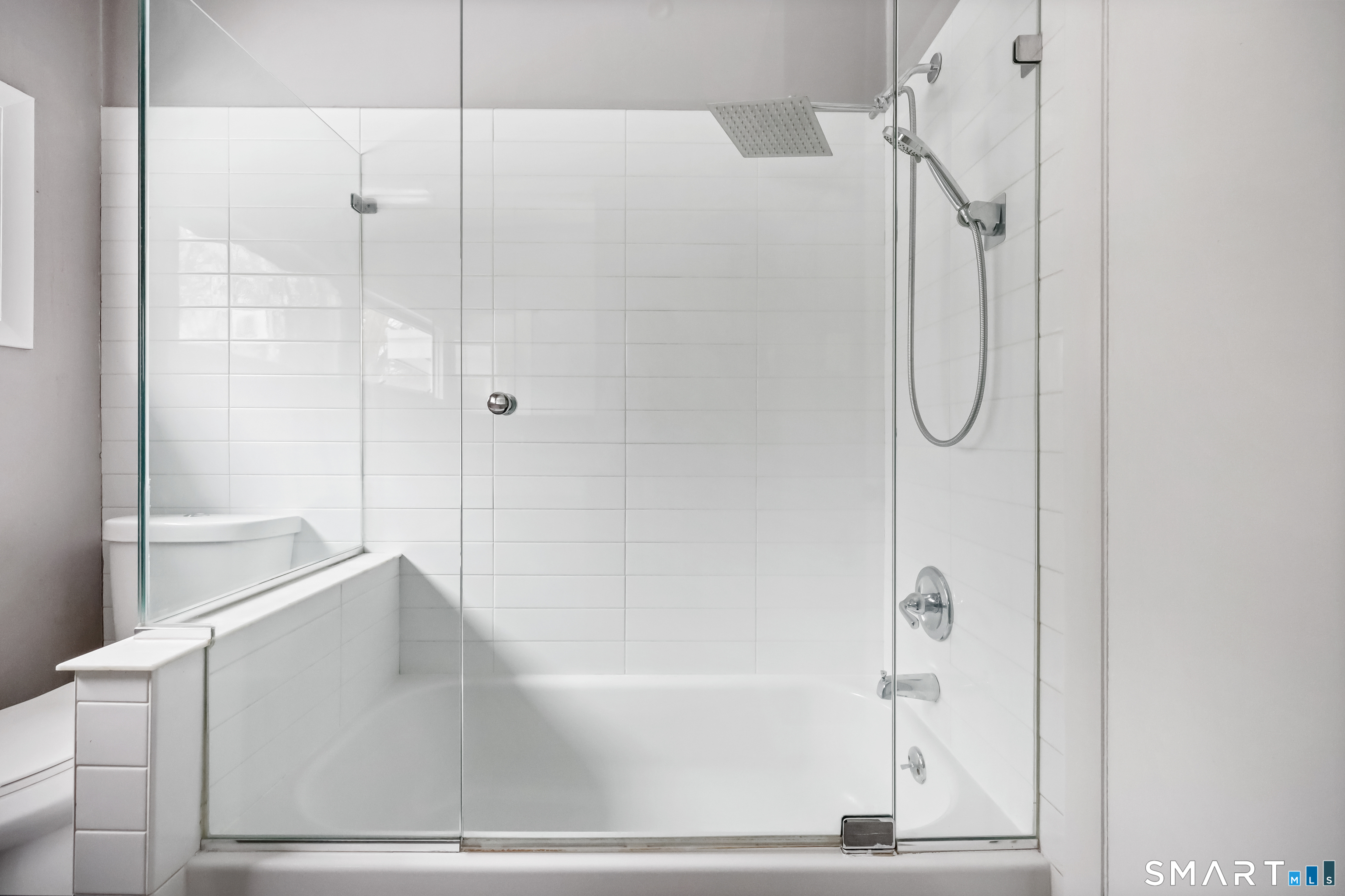 110 Corbin Road Hamden, CT 06517 - Photo 18 of 29 a bathroom with a bathtub and a shower