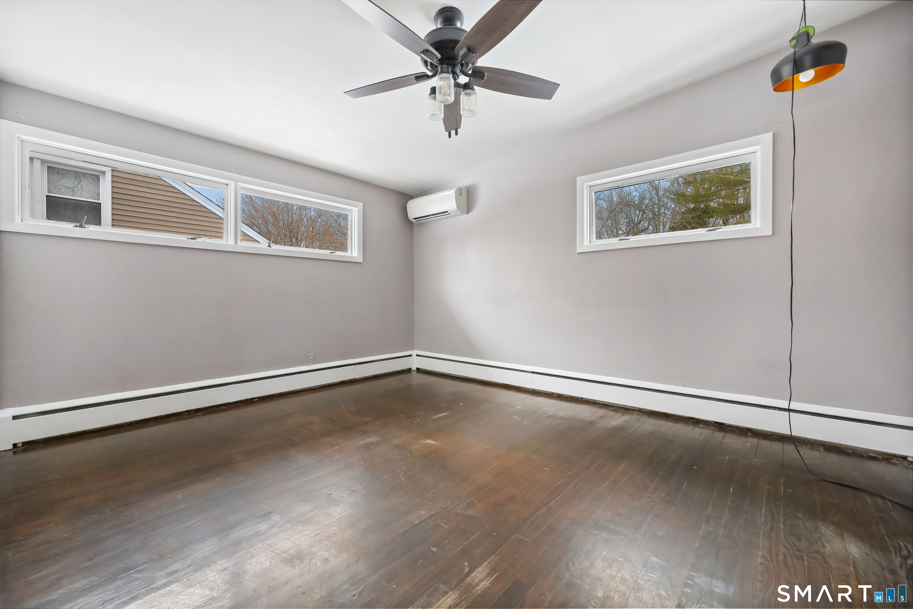 110 Corbin Road Hamden, CT 06517 - Photo 20 of 29 a view of an empty room with a window