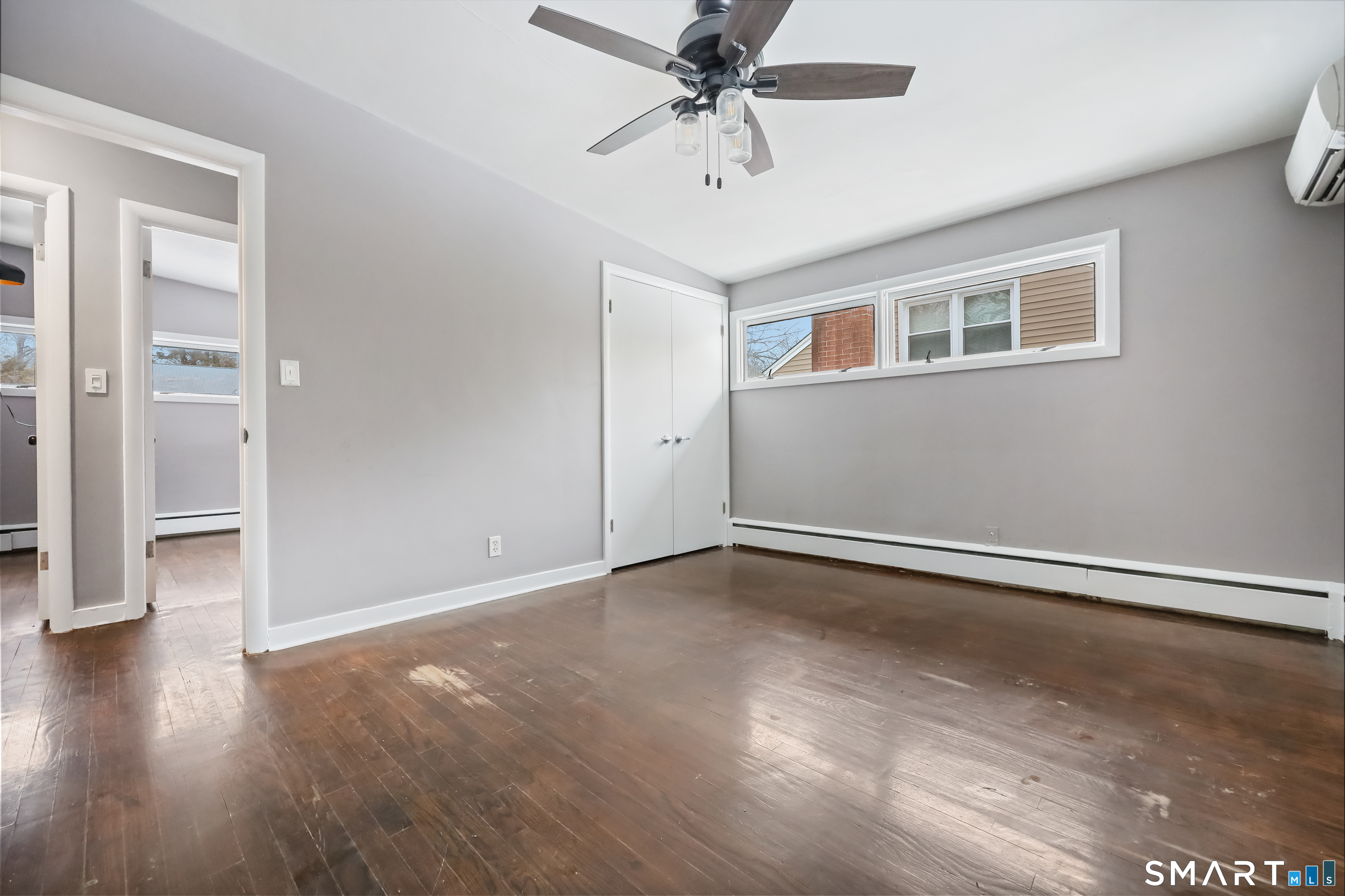 110 Corbin Road Hamden, CT 06517 - Photo 21 of 29 a view of an empty room with wooden floor