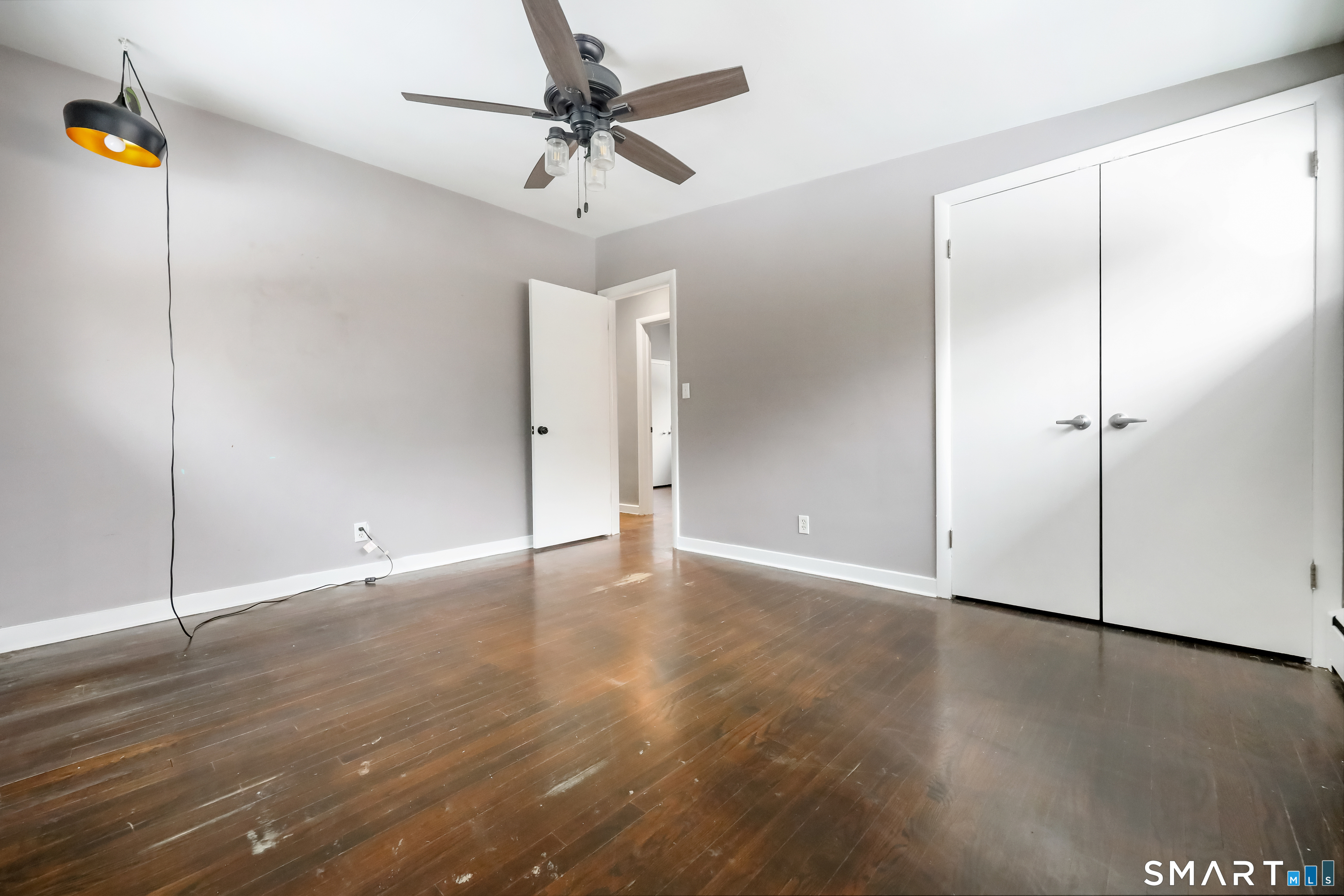 110 Corbin Road Hamden, CT 06517 - Photo 22 of 29 a view of an empty room with wooden floor