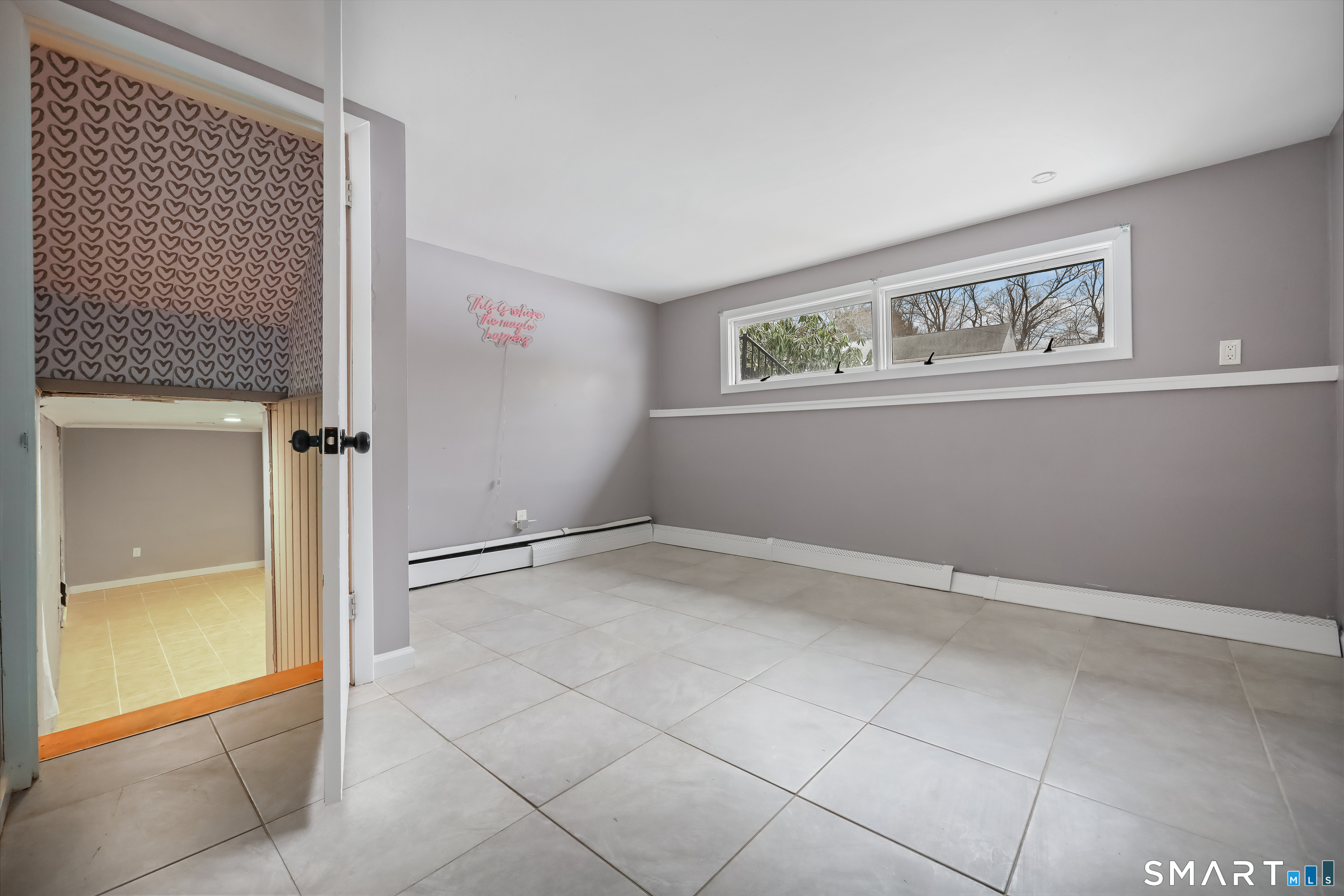 110 Corbin Road Hamden, CT 06517 - Photo 8 of 29 a view of an empty room with a window