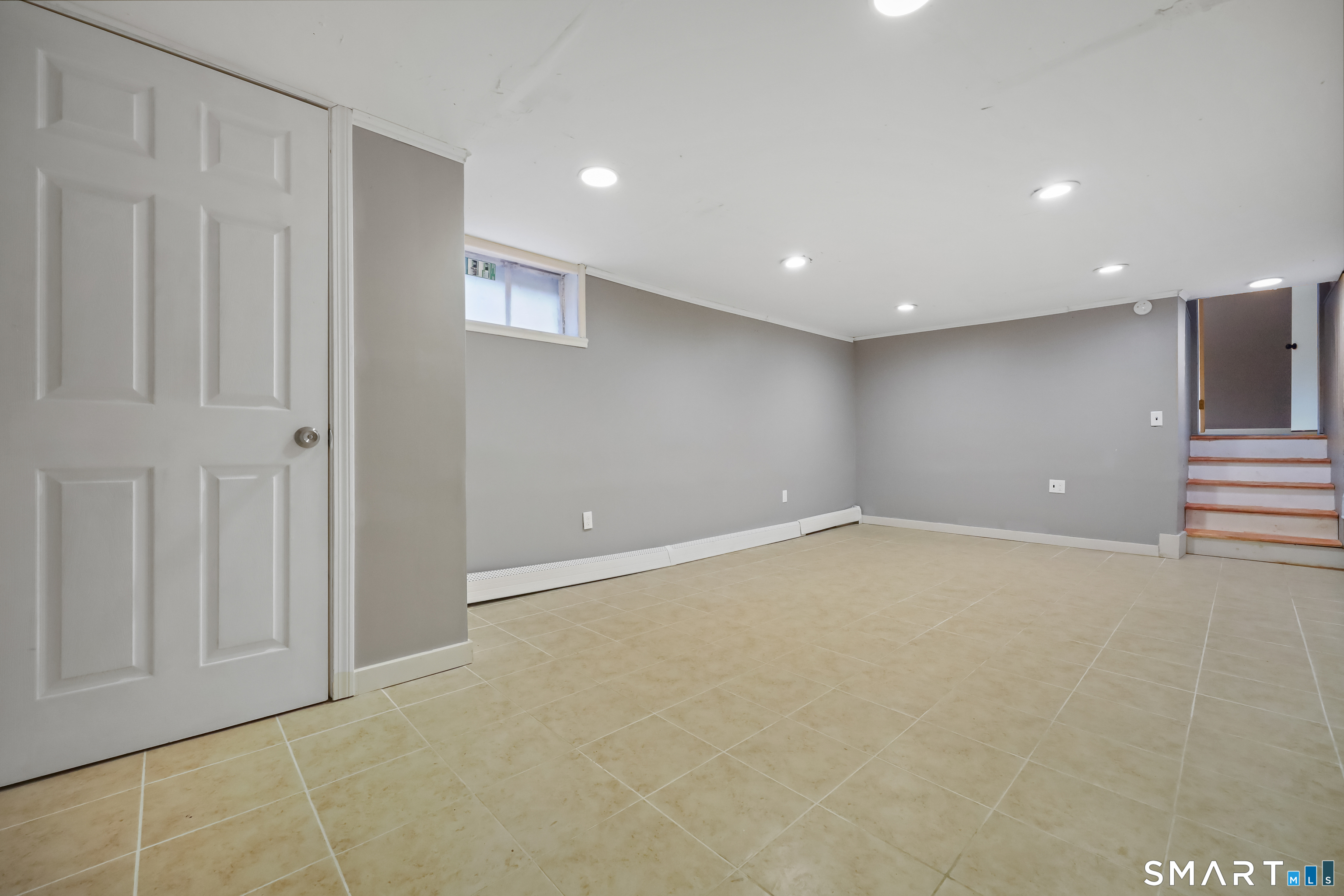 110 Corbin Road Hamden, CT 06517 - Photo 10 of 29 a view of an empty room with a window