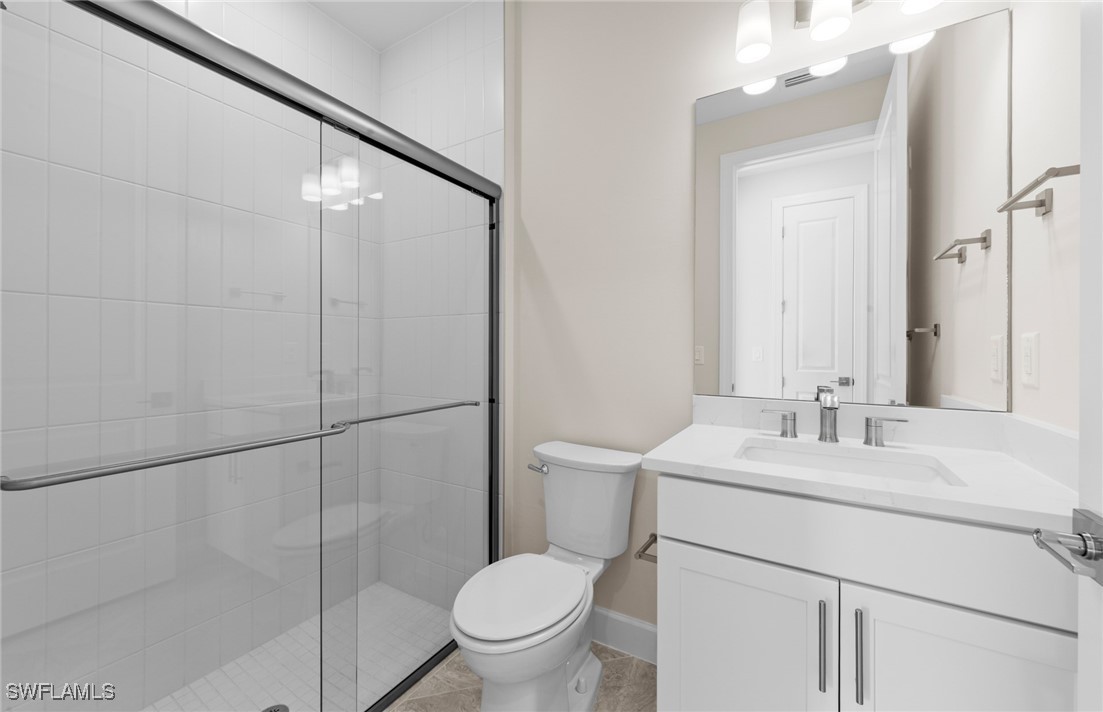 16784 Rolling Rock Boulevard Alva, FL 33920 - Photo 17 of 29 a bathroom with a sink toilet and shower