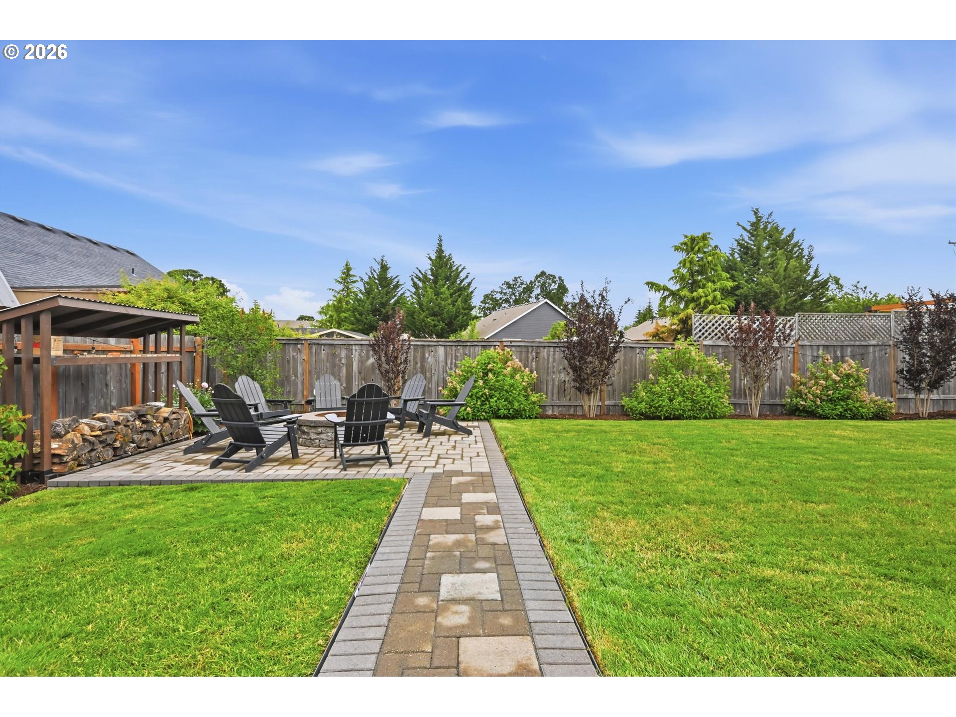 1075 Sage Street Silverton, OR 97381 - Photo 40 of 46 a view of a backyard with sitting area