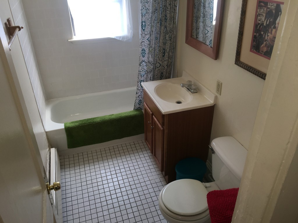31 Iffley Road Boston, MA 02130 - Photo 15 of 21 a bathroom with a sink a toilet and shower