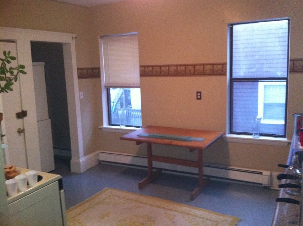 31 Iffley Road Boston, MA 02130 - Photo 8 of 21 a room with furniture and window