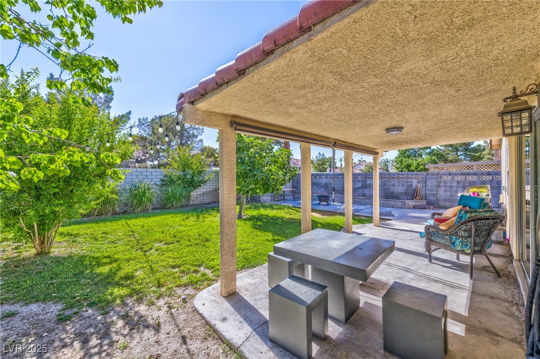 640 Whispering Palms Drive Las Vegas, NV 89123 - Photo 16 of 16 Fenced backyard featuring a patio