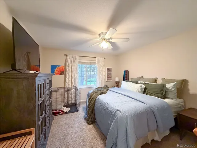 a white toilet sitting next to a bathroom sink and tub