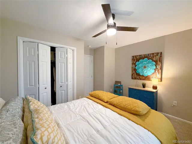a view of a patio with table and chairs and potted plants