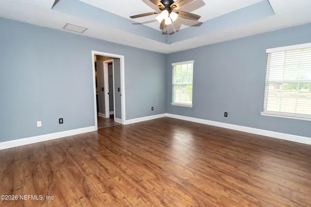 a view of an empty room and window