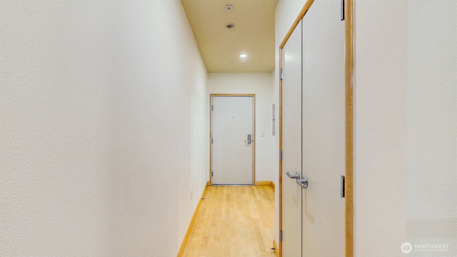 2015 Terry Avenue, Unit 301 Seattle, WA 98121 - Photo 12 of 15 a view of hallway with wooden floor