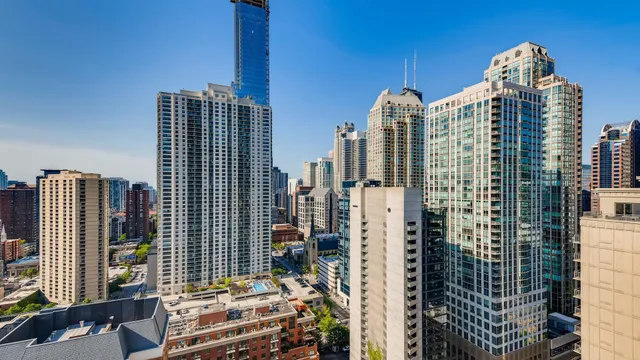 a kitchen with sink refrigerator and window