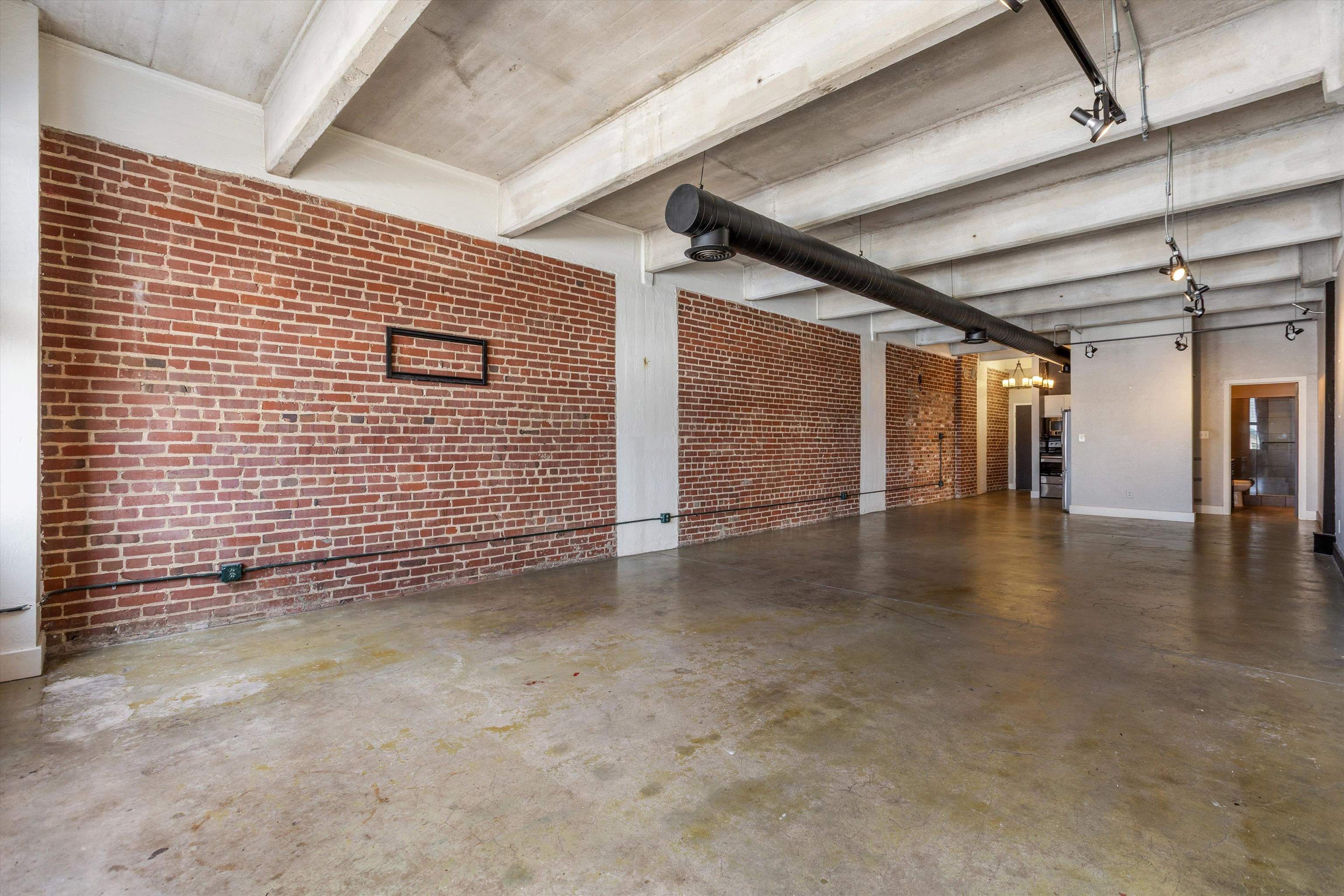 408 South Front Street, Unit 413 Memphis, TN 38103 - Photo 13 of 30 a view of a hallway with stairs